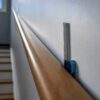 Close-up measuring handrail wall clearance