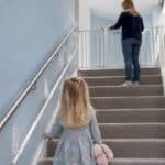 Wide staircase fitted with safety gate and child rail