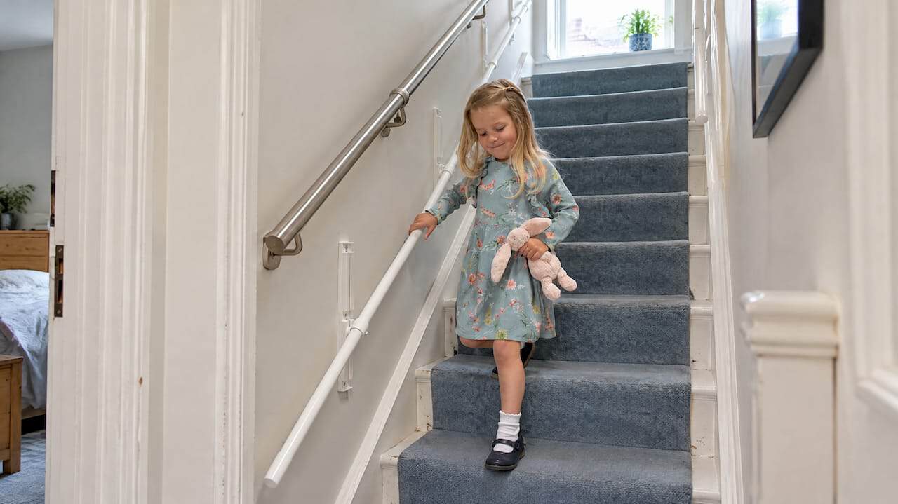 KiddieRail child handrail on home staircase