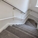 KiddieRail installed beside a home staircase