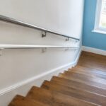 KiddieRail mounted below an adult stair rail