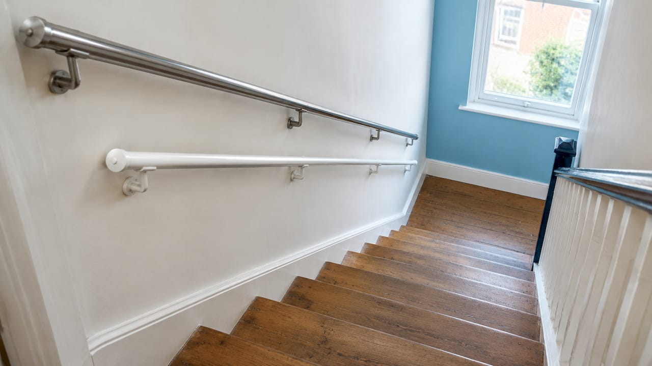 KiddieRail mounted below an adult stair rail