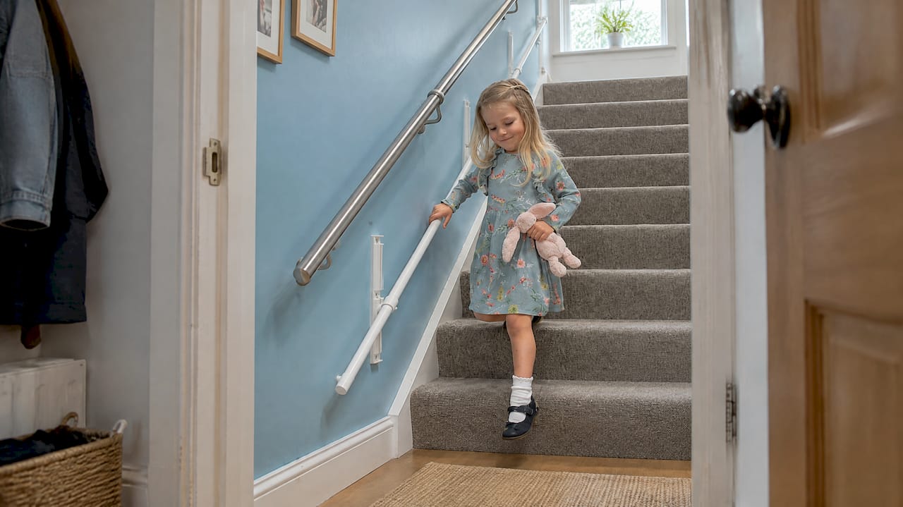 KiddieRail fitted beside a family staircase